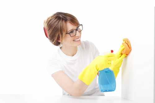 Cleaning technician treating stains on a carpet