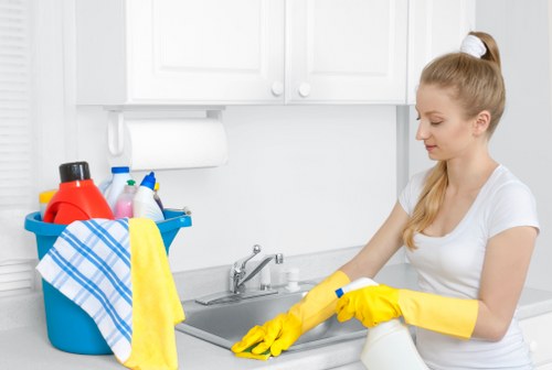 Staff member wearing PPE during a carpet cleaning job in Shepherdsbush
